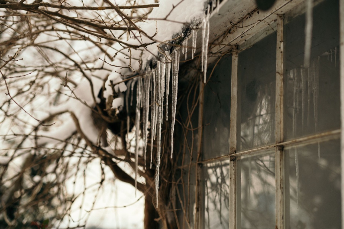 shrine combs snow-covered with icicles