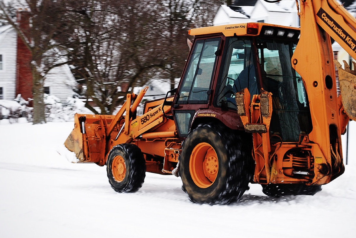 Snowy road with snowplow